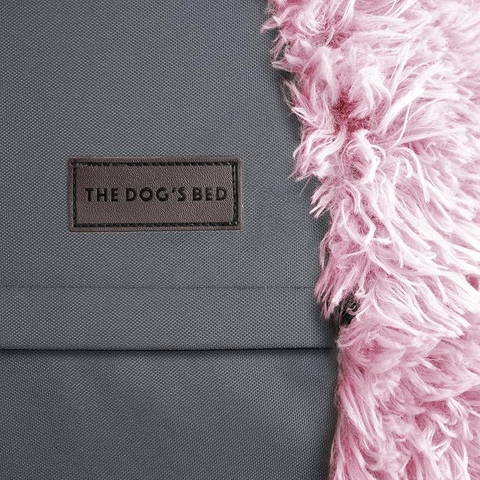 The Dog’s Bed Sound Sleep Original Donut Dog Bed, XXL Rose Pink Plush Removable Cover Calming Nest Bed, Veterinary Approved