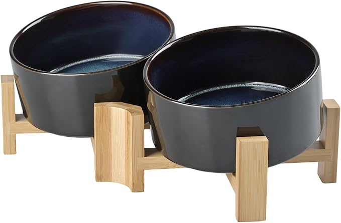 SPUNKYJUNKY 15° Slanted Ceramic Dog and Cat Bowl with Wooden Stand, Tilted Bulldog Food and Water Bowl No Slip Non-Spill for Cats Medium Dogs Big Face Pets 28.7 OZ (3.6 Cups, Starry Blue × 2)